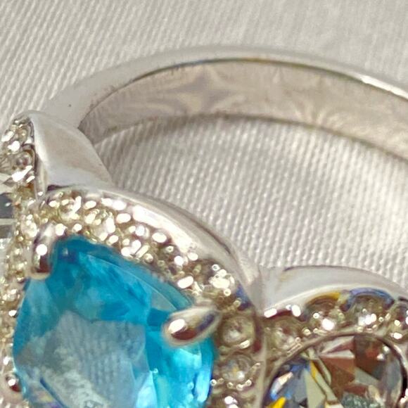 Silver Tone Cocktail Ring With Aqua Blue Central Stone And Clear Side Stones - Picture 7 of 9